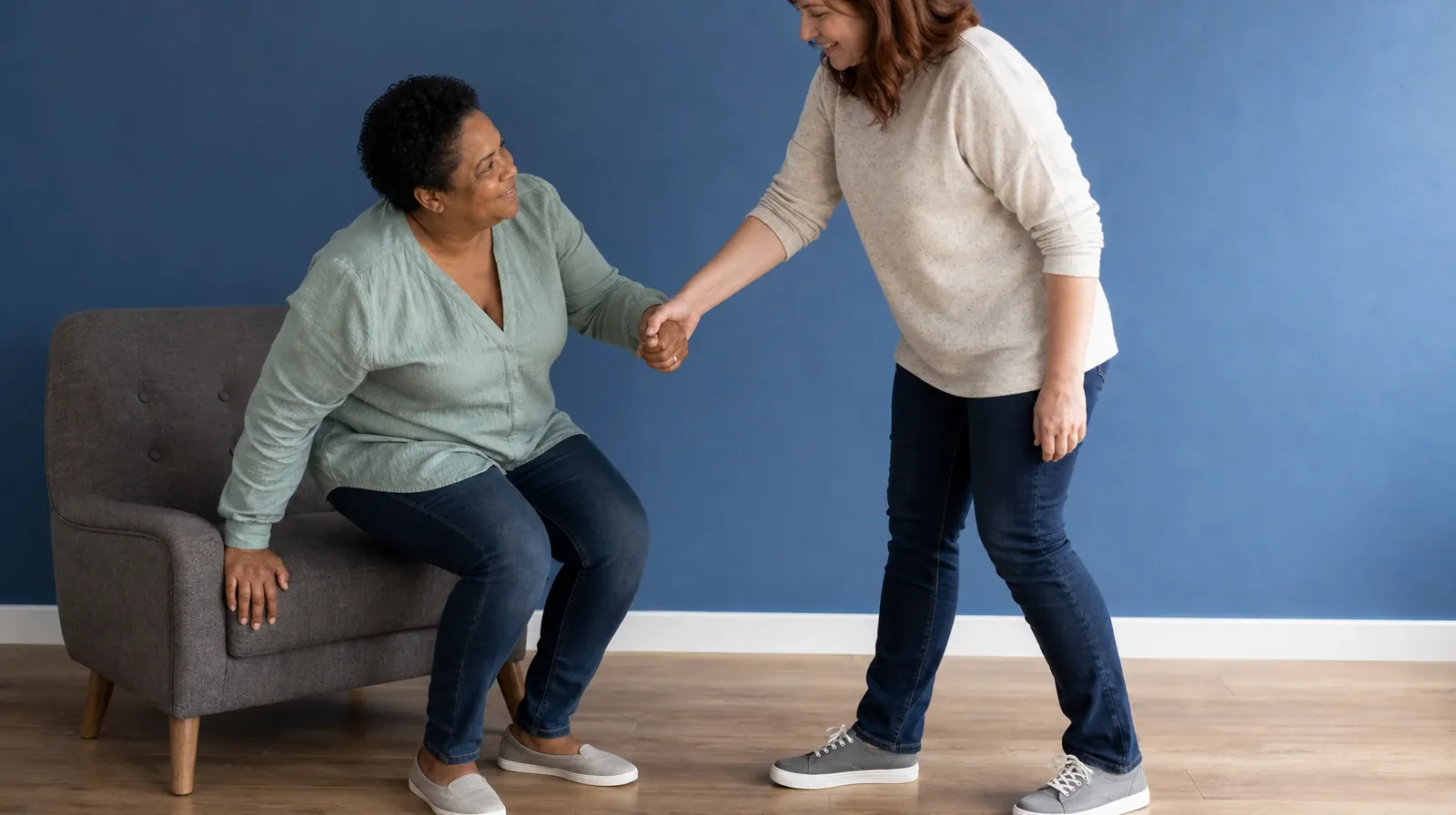 An adult accepts an offered hand while rising from a low… · Adult Recovery Support Resources for Big Pine Key, FL Residents