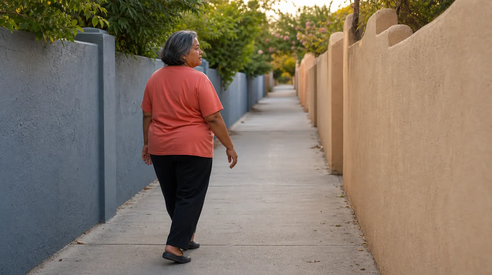 Alcohol Addiction Treatment for Big Torch Key, FL Residents | An adult walks alone along a level passage between two low… An adult walks alone along a level passage between two low… · Alcohol Addiction Treatment for Big Torch Key, FL Residents