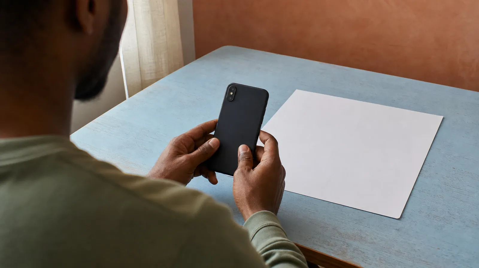 Prescription drugs Addiction Treatment for Boca Raton, FL | An adult holds a phone with its screen hidden above a blank… An adult holds a phone with its screen hidden above a blank… · Prescription drugs Addiction Treatment for Boca Raton, FL