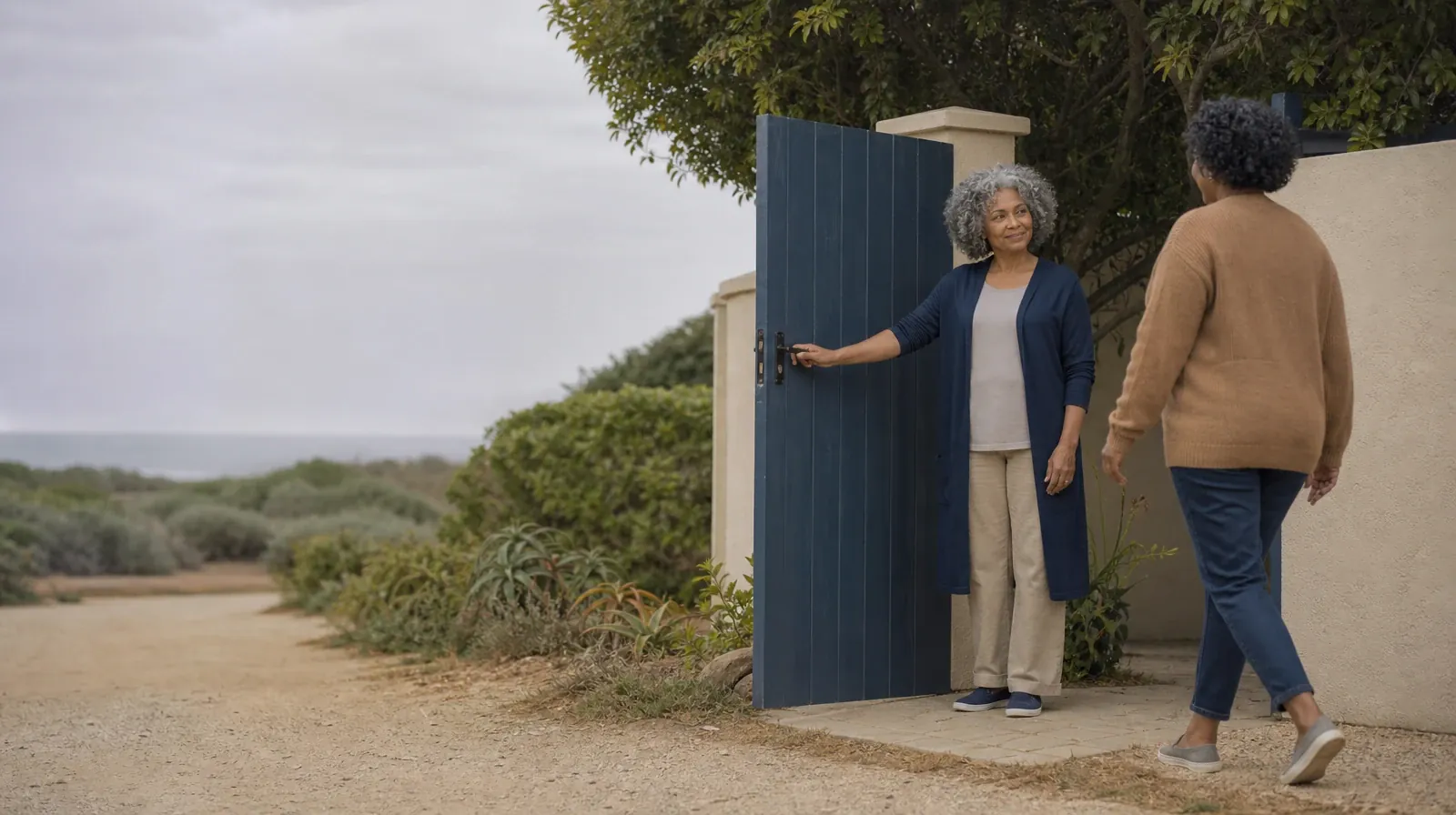 One adult holds a garden gate for another · Starting a Treatment Conversation for Coral Springs, FL Residents