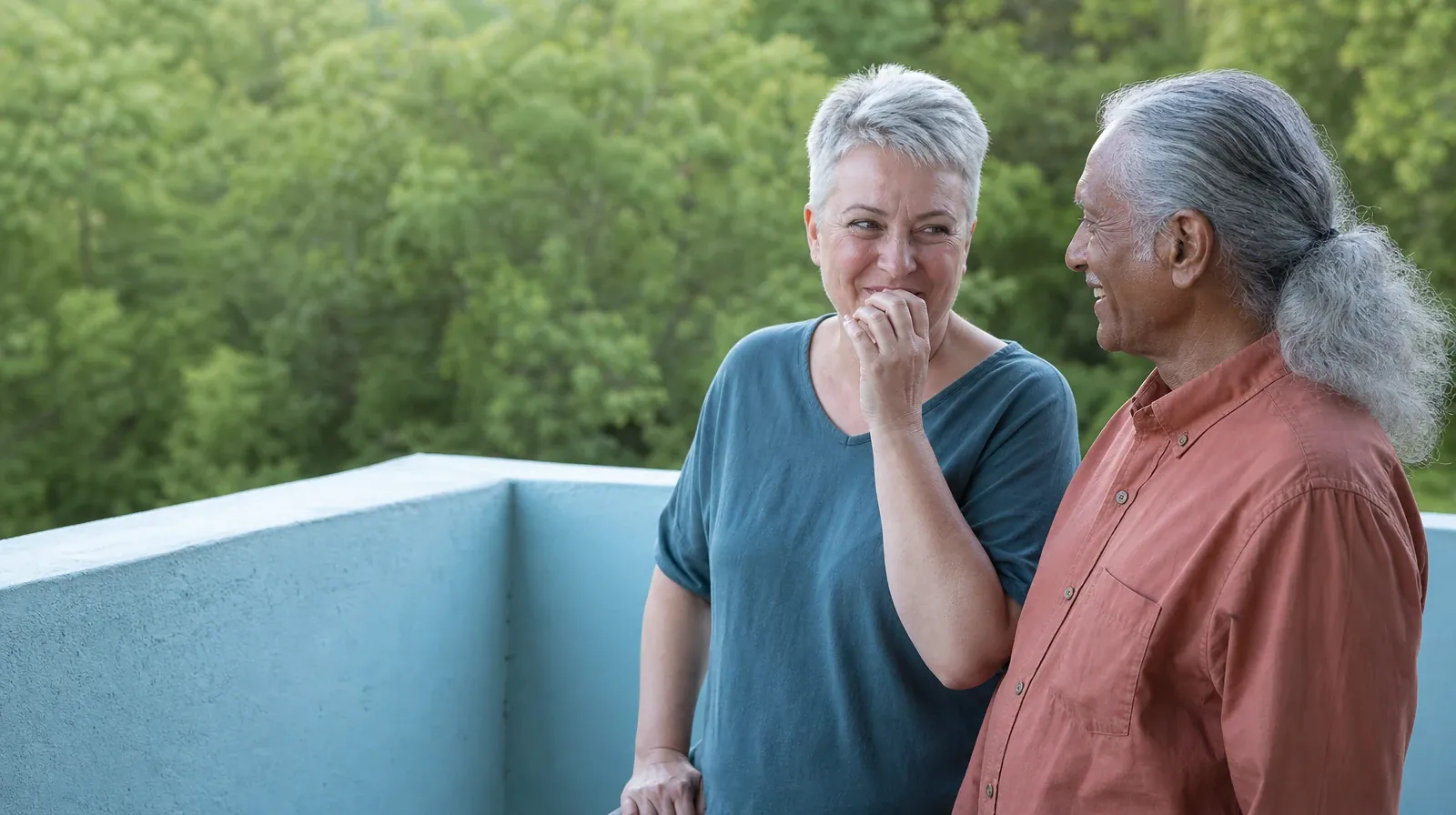 Addiction Treatment for Dania Beach, FL Residents | One adult lifts a hand near their mouth during a small laugh while… One adult lifts a hand near their mouth during a small laugh while… · Addiction Treatment for Dania Beach, FL Residents