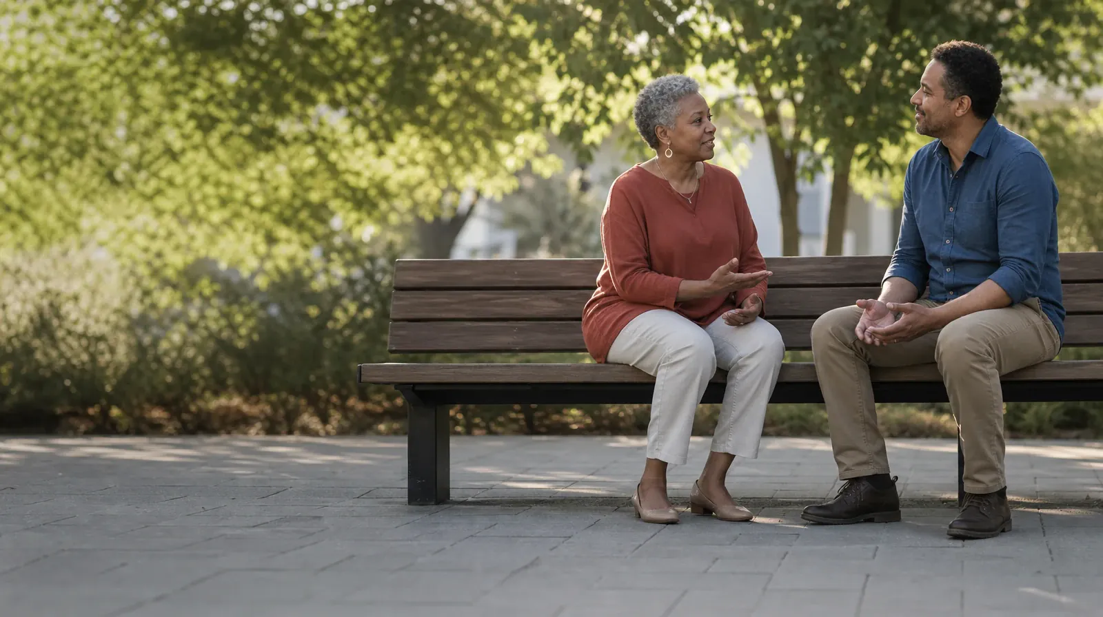 Adult Recovery Support Resources for Highland Beach, FL Residents | Two adults sit on an outdoor bench and talk Two adults sit on an outdoor bench and talk · Adult Recovery Support Resources for Highland Beach, FL Residents