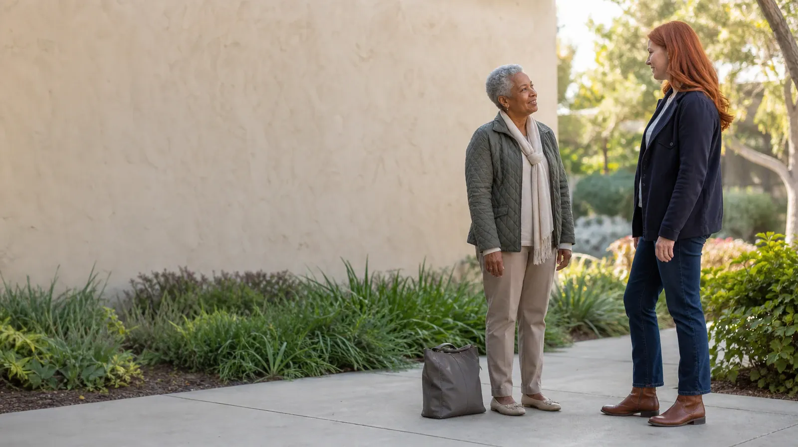Morphine Addiction Treatment for Miami, FL Residents | Two adults exchange a small nod on a home front walk beside a closed… Two adults exchange a small nod on a home front walk beside a closed… · Morphine Addiction Treatment for Miami, FL Residents