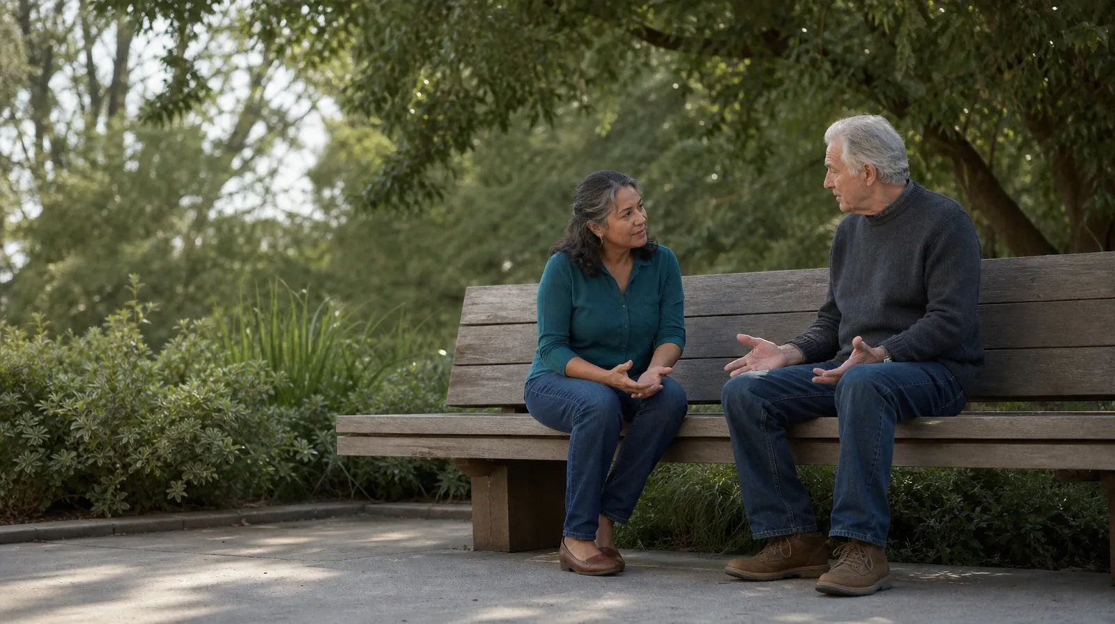 Addiction Treatment for Midtown, Miami, FL Residents | Two adults sit on an outdoor bench and talk Two adults sit on an outdoor bench and talk · Addiction Treatment for Midtown, Miami, FL Residents