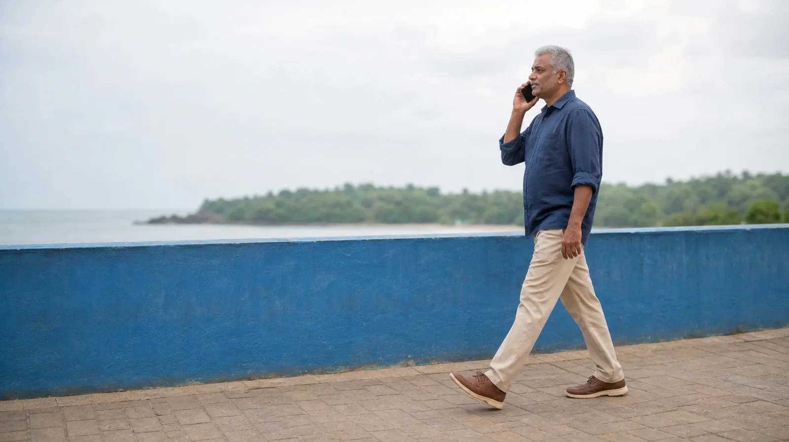 An adult speaks on a phone while walking along a level… · Methamphetamine Addiction Treatment for Middle Torch Key, FL