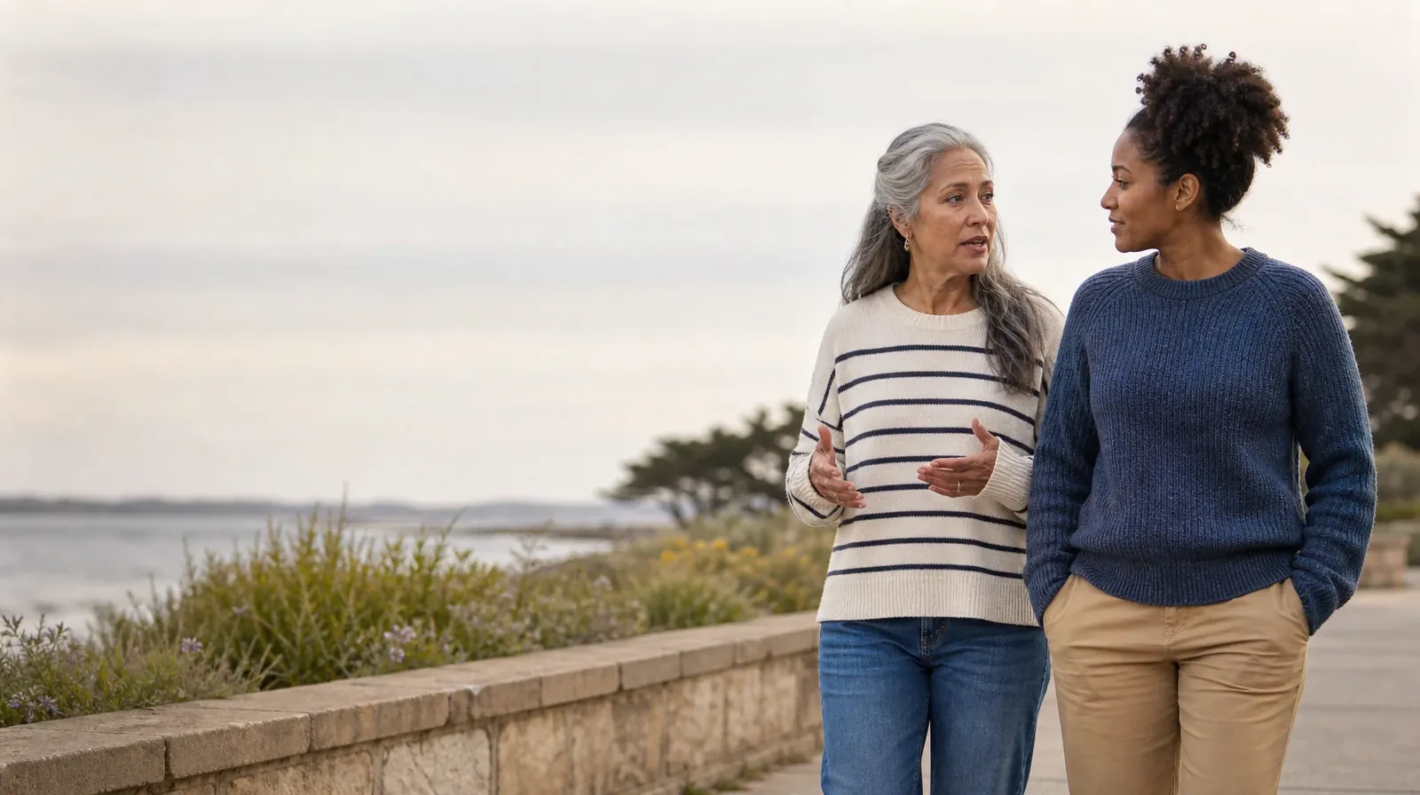 Treatment Cost Questions for Miramar, FL Residents | Two adults walk and talk beside a garden wall Two adults walk and talk beside a garden wall · Treatment Cost Questions for Miramar, FL Residents