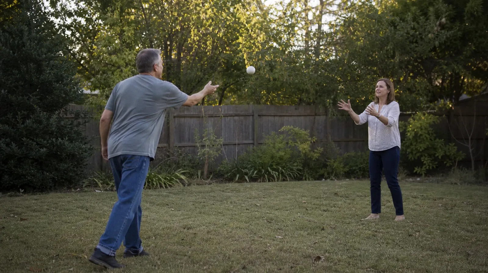 Starting a Treatment Conversation for No Name Key, FL Residents | Two adults toss a soft ball to each other in a grassy… Two adults toss a soft ball to each other in a grassy… · Starting a Treatment Conversation for No Name Key, FL Residents