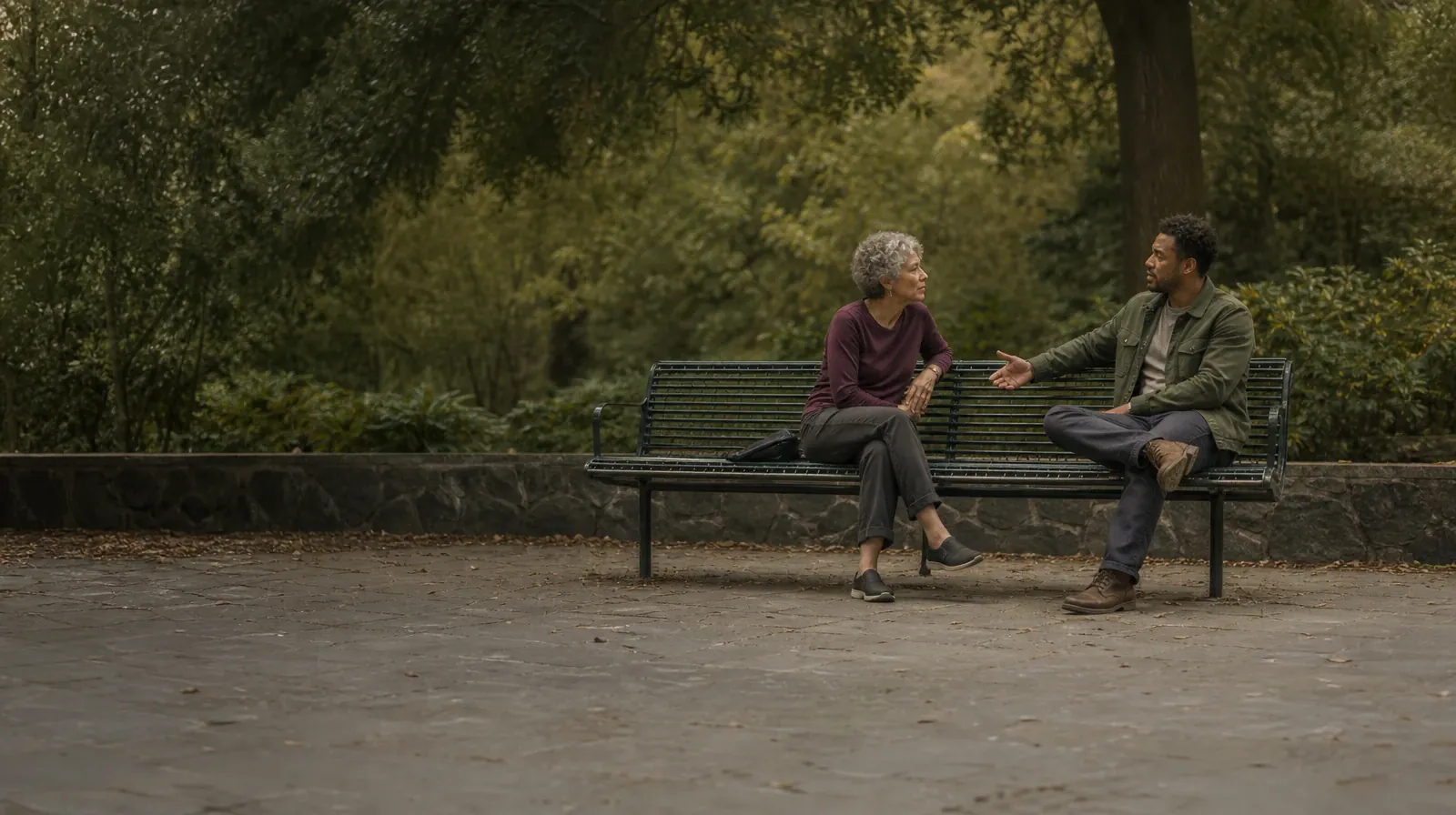 Returning Home After Treatment for Palm Beach, FL Residents | Two adults sit on an outdoor bench and talk Two adults sit on an outdoor bench and talk · Returning Home After Treatment for Palm Beach, FL Residents