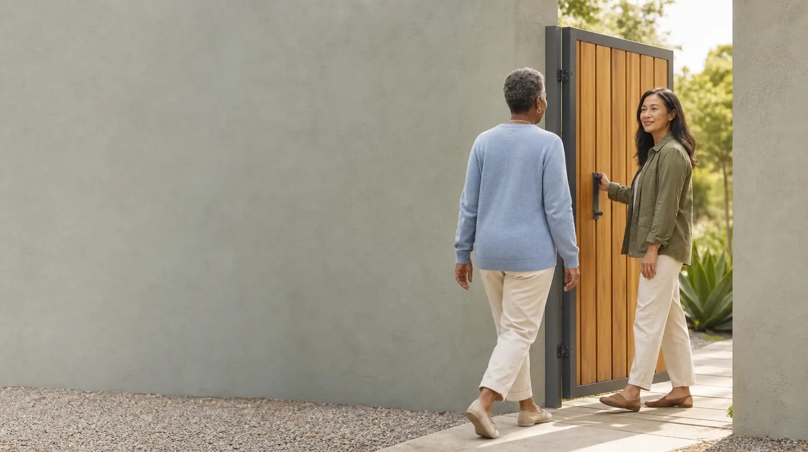 Addiction Treatment for Plantation Key, FL Residents | One adult holds a garden gate for another One adult holds a garden gate for another · Addiction Treatment for Plantation Key, FL Residents