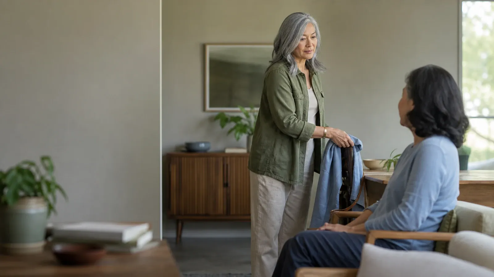 Alcohol Addiction Treatment for Royal Palm Beach, FL Residents | An adult folds a jacket while talking with someone nearby An adult folds a jacket while talking with someone nearby Β· Alcohol Addiction Treatment for Royal Palm Beach, FL Residents