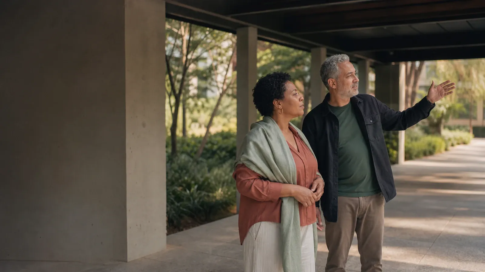 Supporting an Adult Loved One for Surfside, FL Residents | Two adults talk beneath a covered walkway Two adults talk beneath a covered walkway · Supporting an Adult Loved One for Surfside, FL Residents
