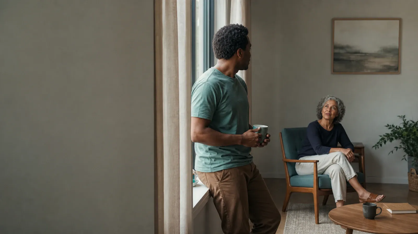 An adult turns from a window toward another adult · Benzodiazepines Addiction Treatment for Weston, FL Residents