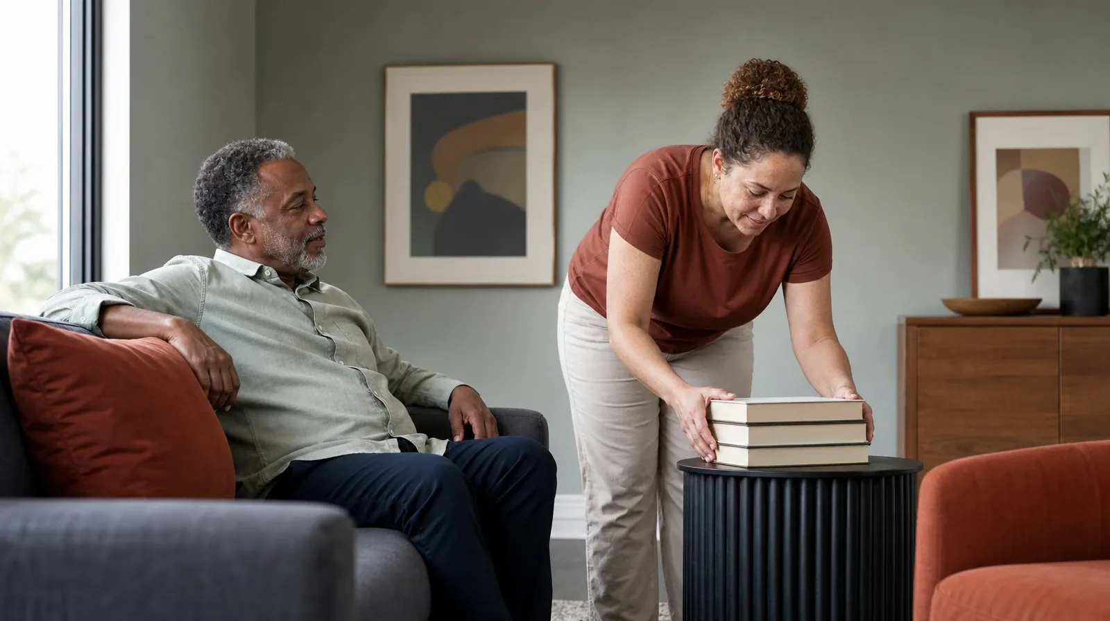 An adult stacks three plain books on a table · Asking for Practical Help With Ativan Use in South Florida