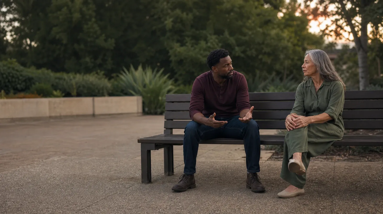 Family Conversations After Treatment for Crack cocaine Use | Two adults sit on an outdoor bench and talk Two adults sit on an outdoor bench and talk · Family Conversations After Treatment for Crack cocaine Use