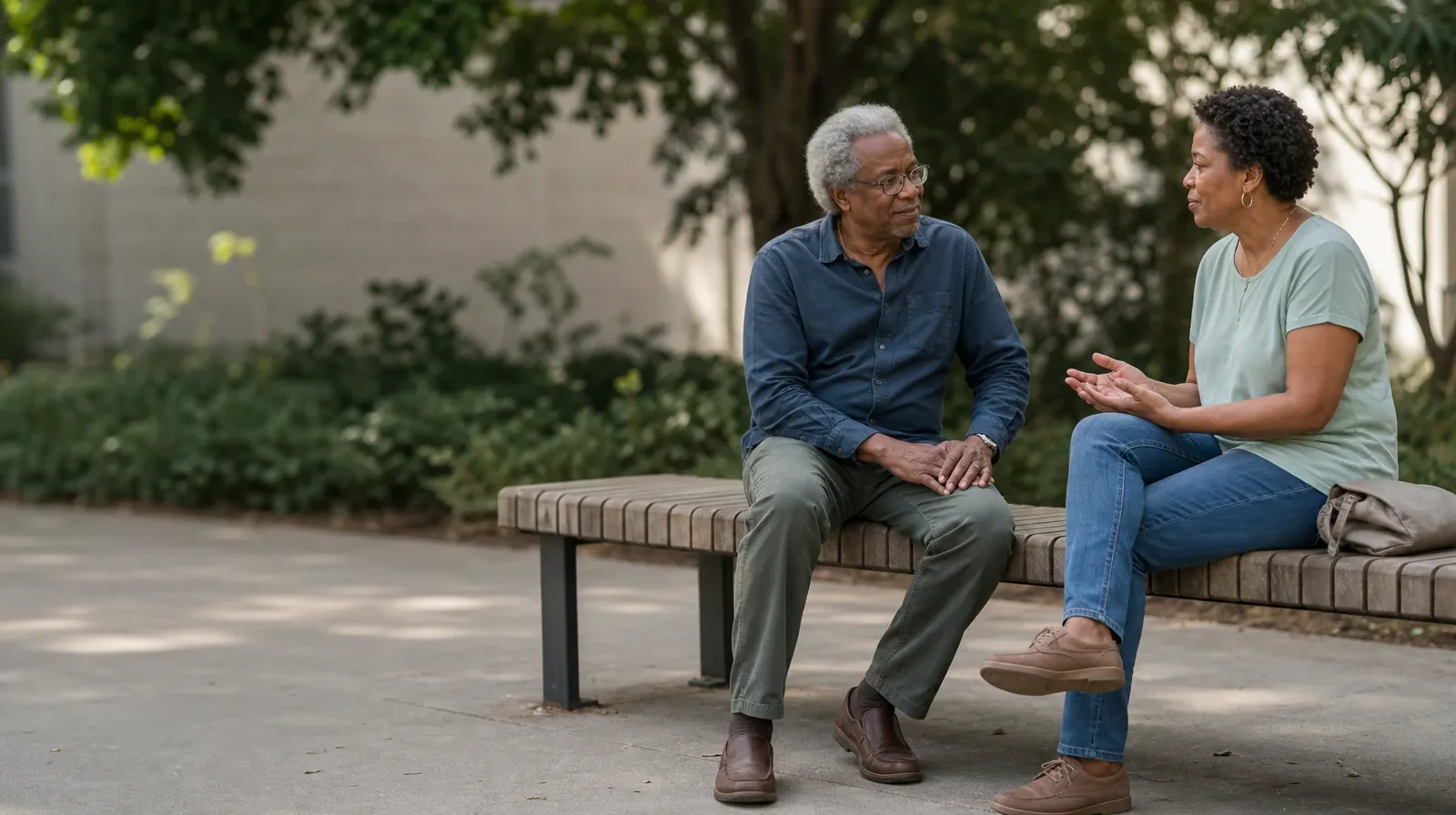 Two adults sit on an outdoor bench and talk · Preparing for a Medical Visit About Restoril Use in South Florida