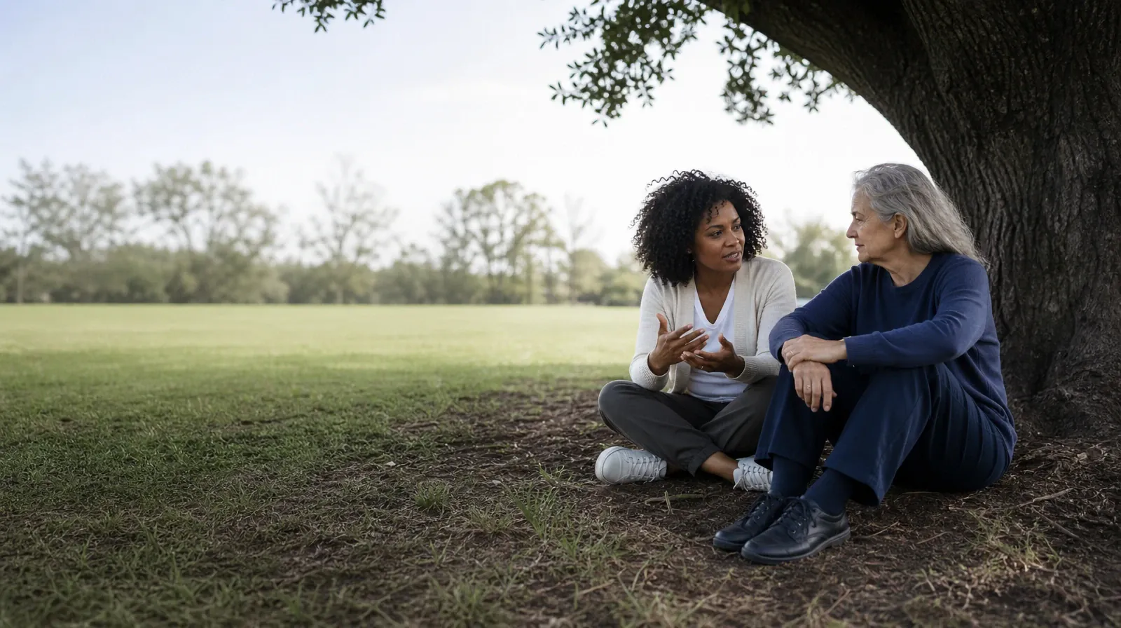 Keeping Recovery Appointments With Synthetic cannabinoids Use | Two adults talk beneath a tree at a public green Two adults talk beneath a tree at a public green · Keeping Recovery Appointments With Synthetic cannabinoids Use