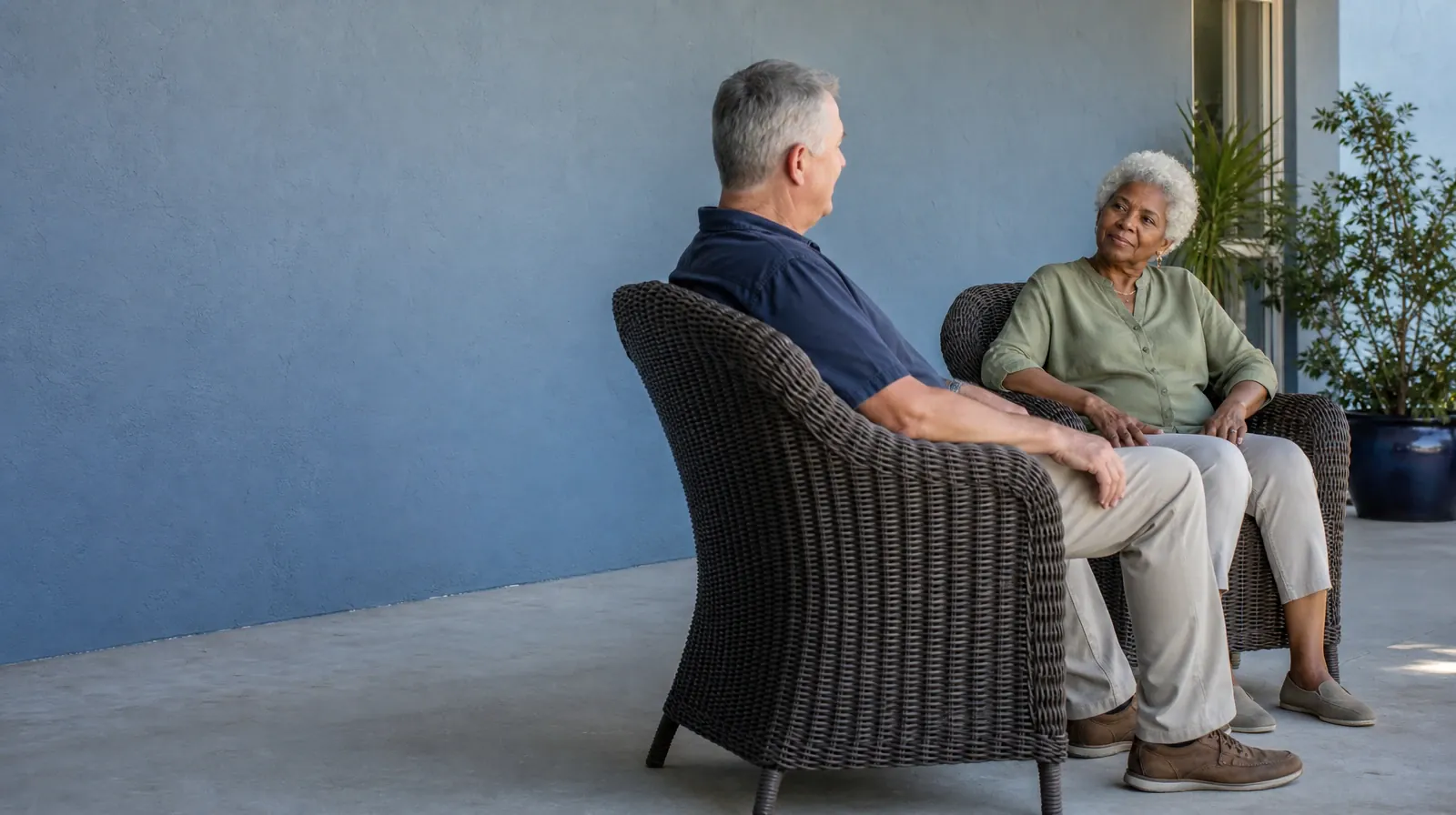 Pain and Treatment Questions About Alcohol Use in South Florida | Two adults sit in separate deckchairs at right angles… Two adults sit in separate deckchairs at right angles… · Pain and Treatment Questions About Alcohol Use in South Florida