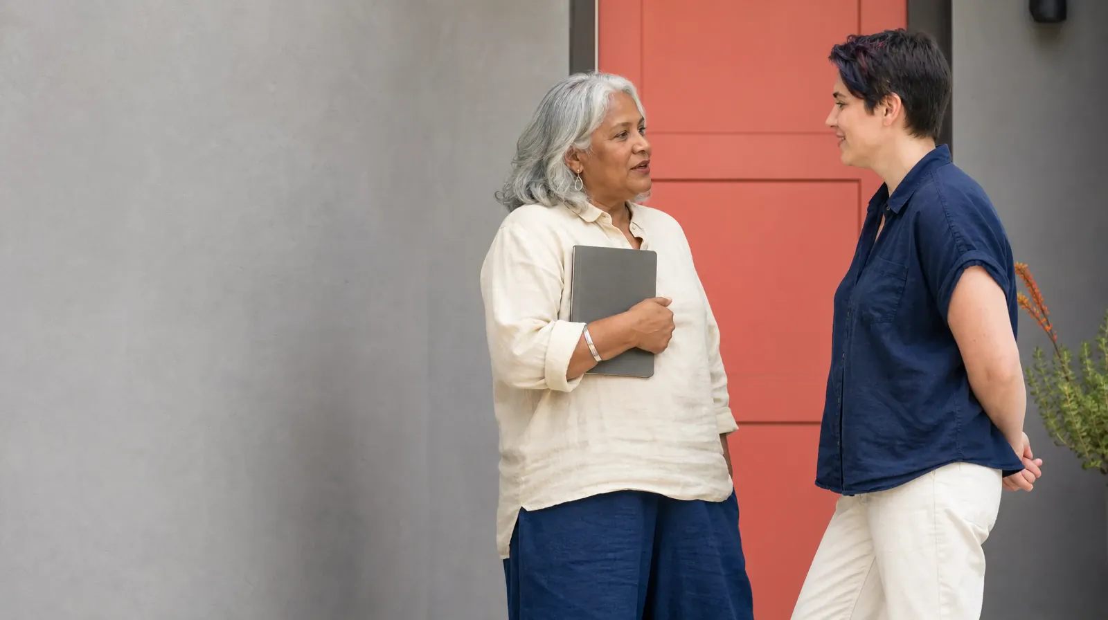 An adult holds a closed notebook against their chest while… · What to Tell a Clinician About Alcohol Use in South Florida