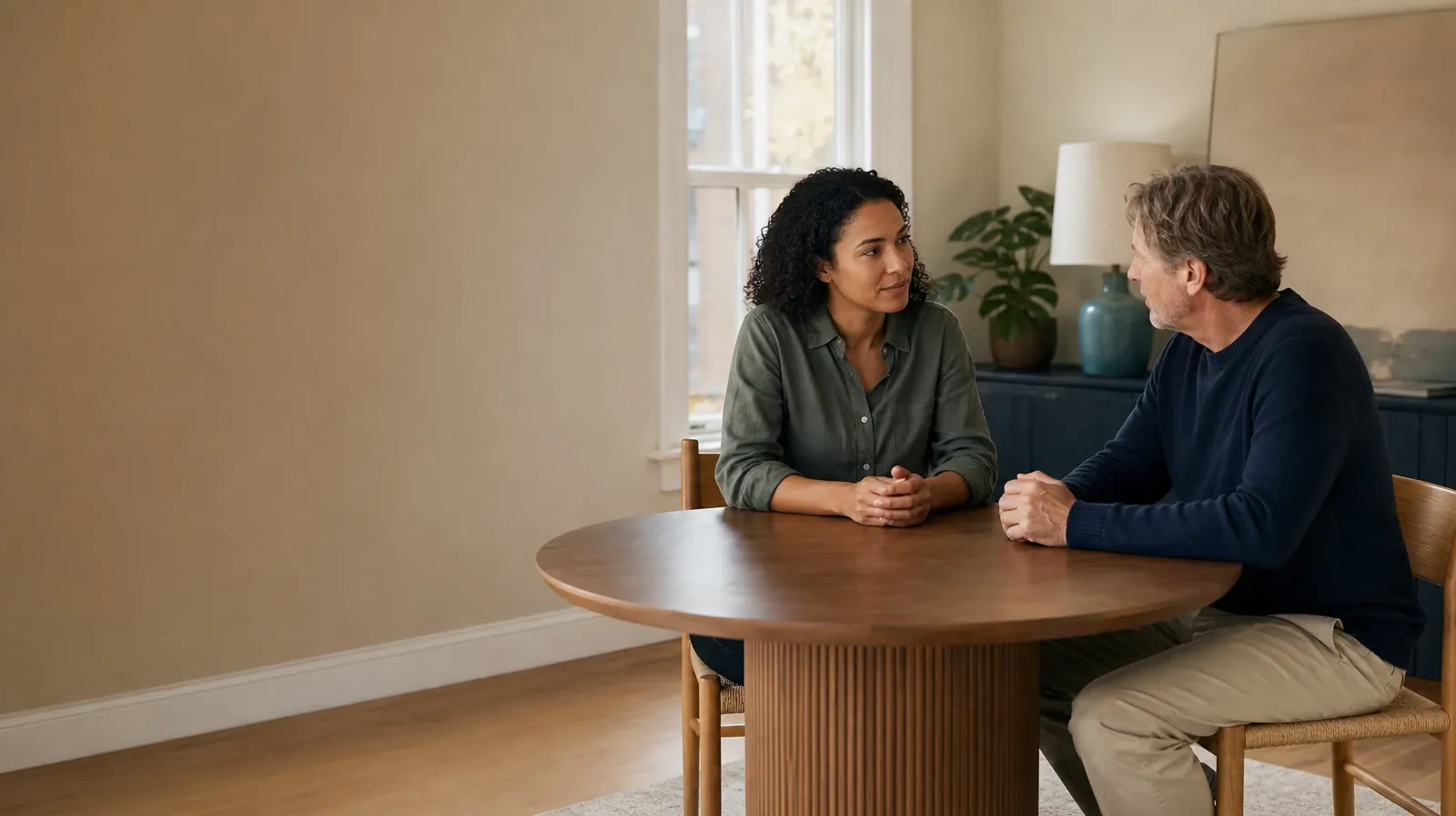 Withdrawal Assessment for Codeine Use in South Florida | Two adults have a calm conversation at a round table Two adults have a calm conversation at a round table · Withdrawal Assessment for Codeine Use in South Florida