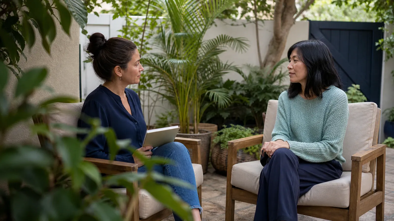 Adults listening to one another in an ordinary setting · Helping an Adult Sibling With Hydromorphone Use in South Florida