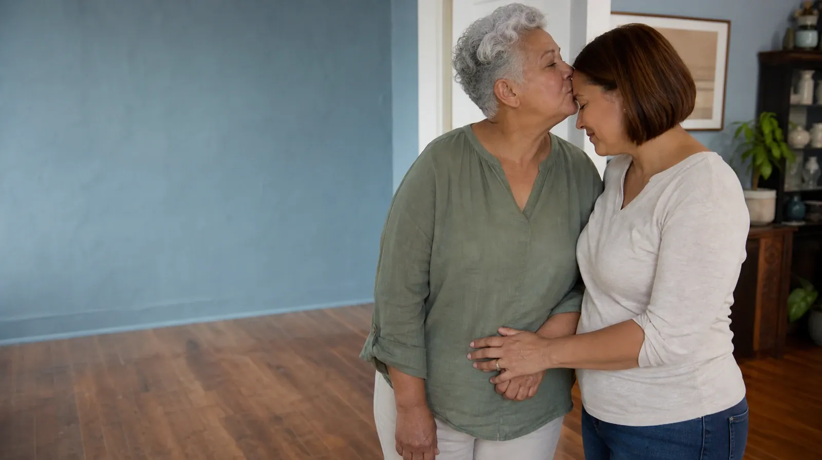 An older adult gives another adult a brief kiss on the forehead · Asking for an Assessment for Cannabis Use in South Florida