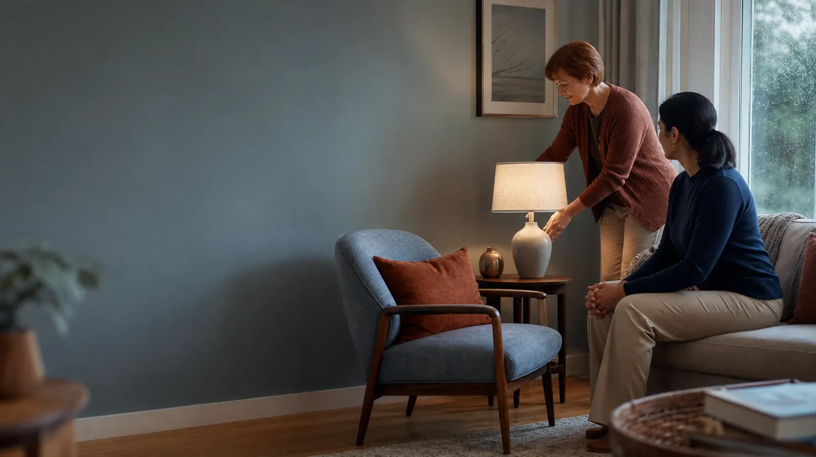 An adult adjusts a lamp while another waits nearby · Understanding a Treatment Plan for Methamphetamine Use