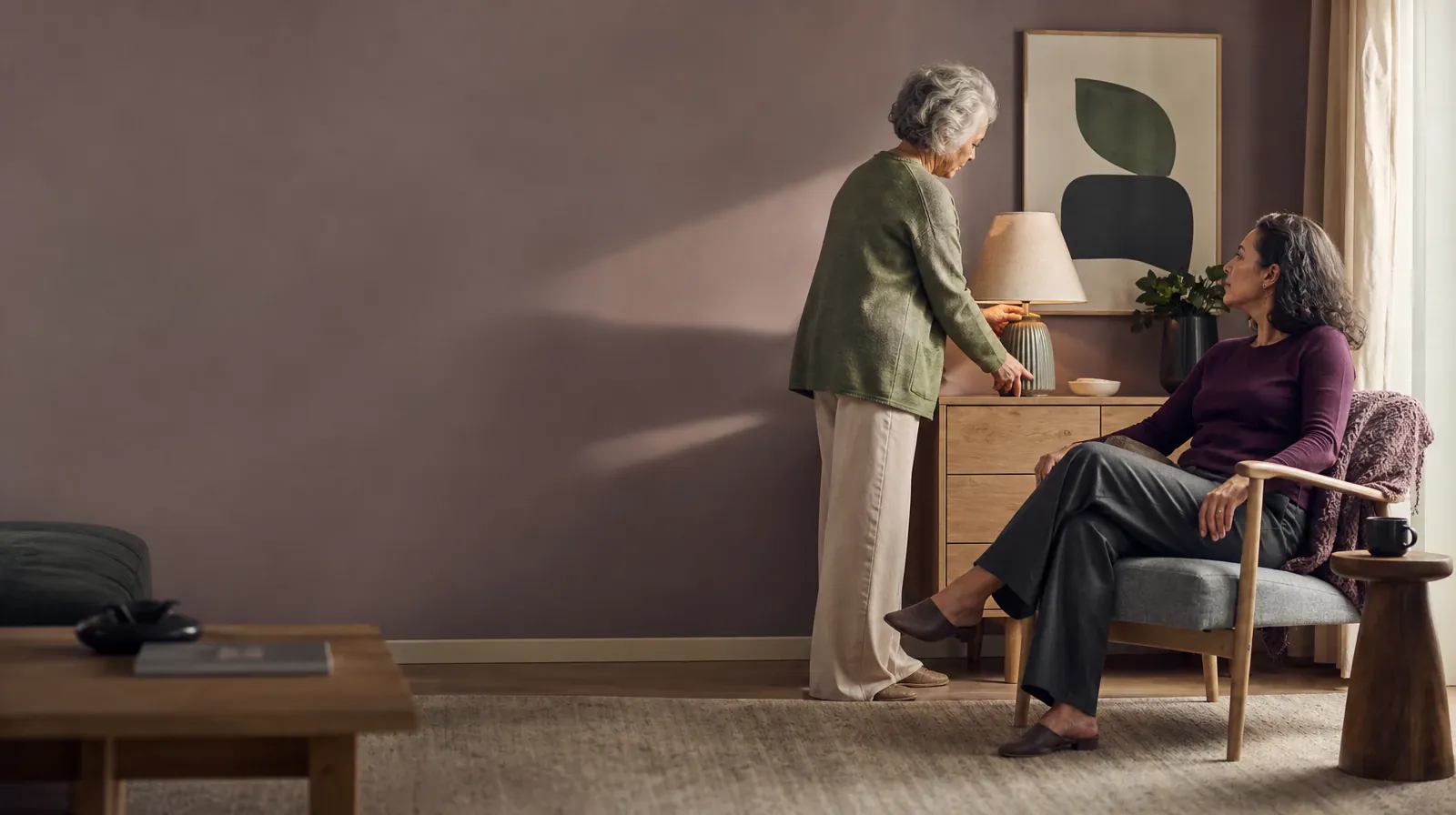 An adult adjusts a lamp while another waits nearby · Treatment Consent and Privacy With Prescription stimulants Use