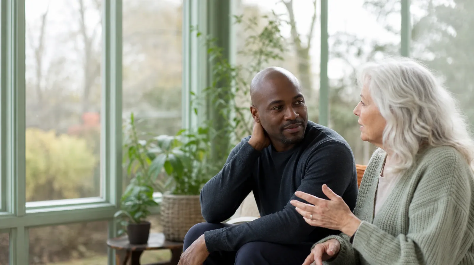 What to Expect From Acceptance and Commitment Therapy | An adult listens with one hand resting at his nape while another… An adult listens with one hand resting at his nape while another… · What to Expect From Acceptance and Commitment Therapy