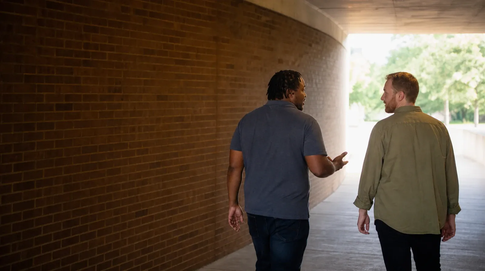 Practicing Between Sessions With Cognitive Behavioral Therapy | Two adults talk during a slow walk through an unmarked… Two adults talk during a slow walk through an unmarked… · Practicing Between Sessions With Cognitive Behavioral Therapy