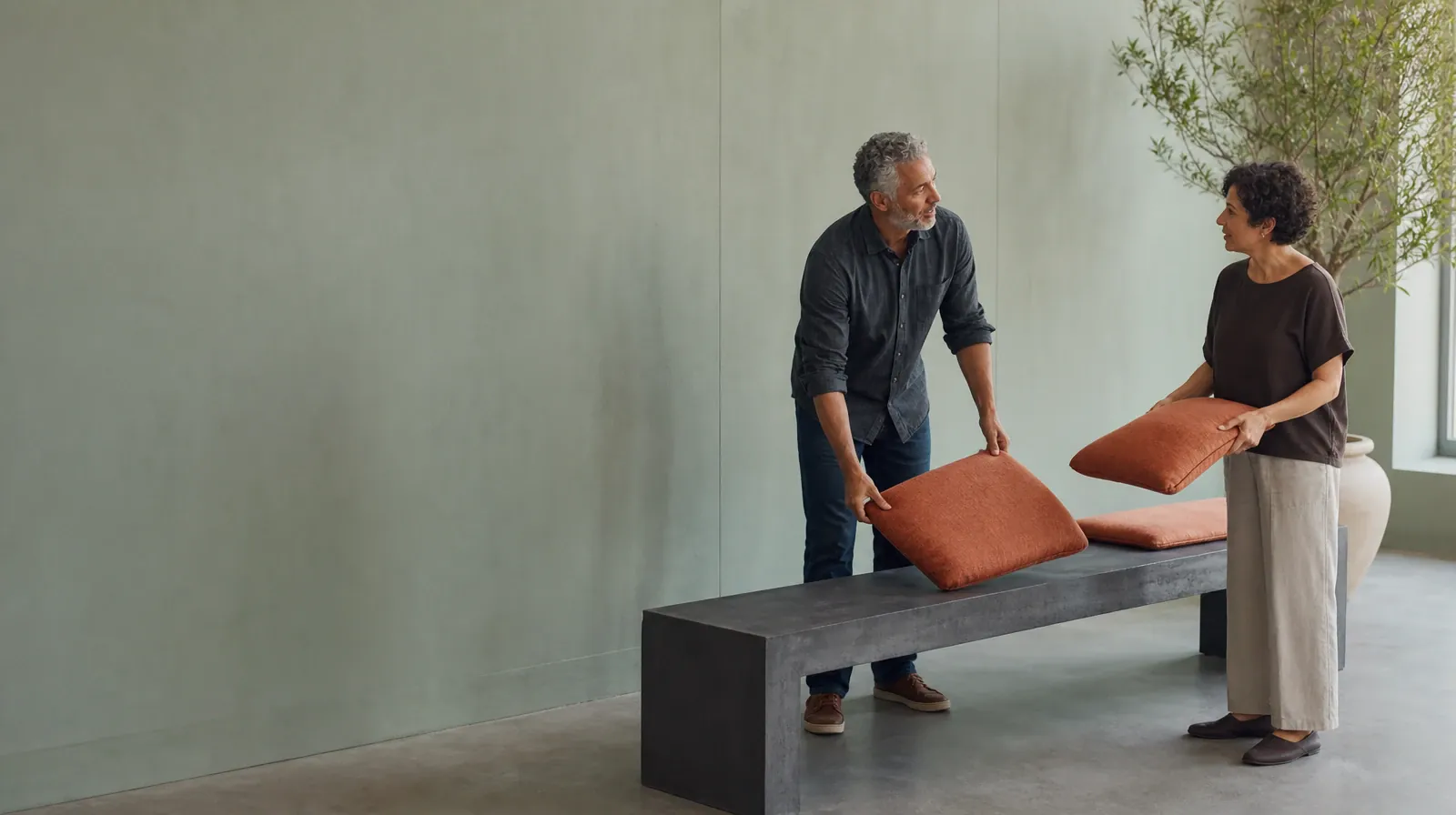 Questions to Ask About Communication skills in South Florida | Two adults pause while arranging cushions on a bench Two adults pause while arranging cushions on a bench · Questions to Ask About Communication skills in South Florida