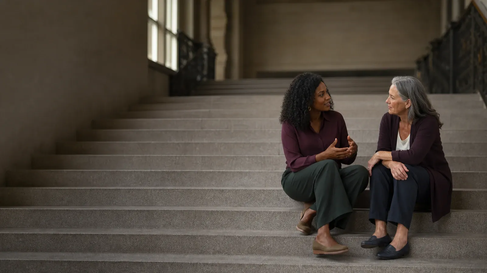 What to Expect From Community reinforcement in South Florida | Two adults talk while seated on broad steps Two adults talk while seated on broad steps · What to Expect From Community reinforcement in South Florida