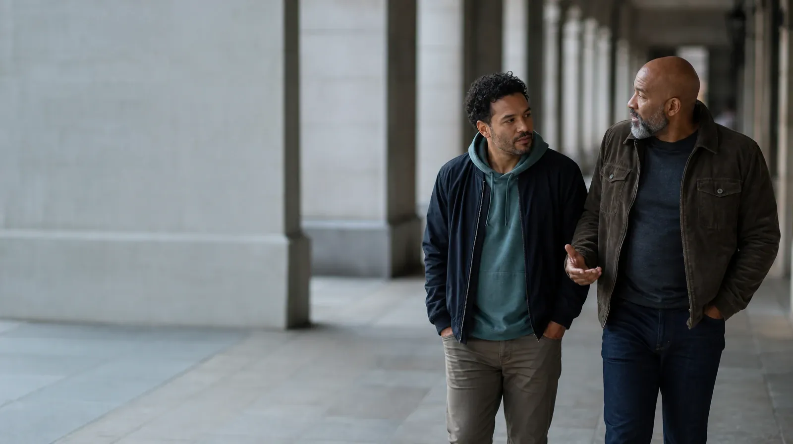 When Contingency Management Does Not Fit | Two adults walk and talk beneath a covered arcade Two adults walk and talk beneath a covered arcade · When Contingency Management Does Not Fit
