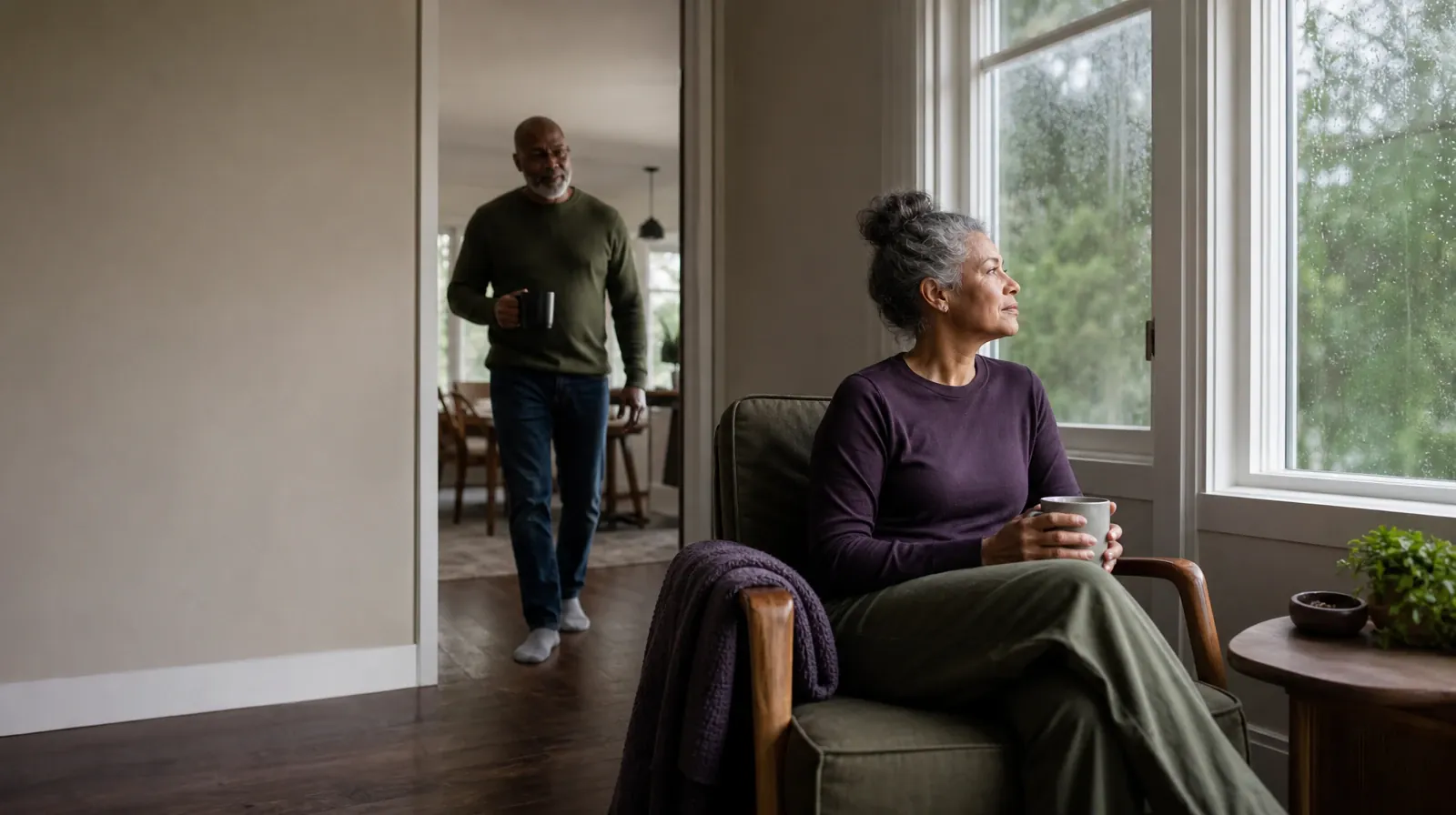 One adult sits near a window as another enters · Daily Routines and Distress tolerance in South Florida