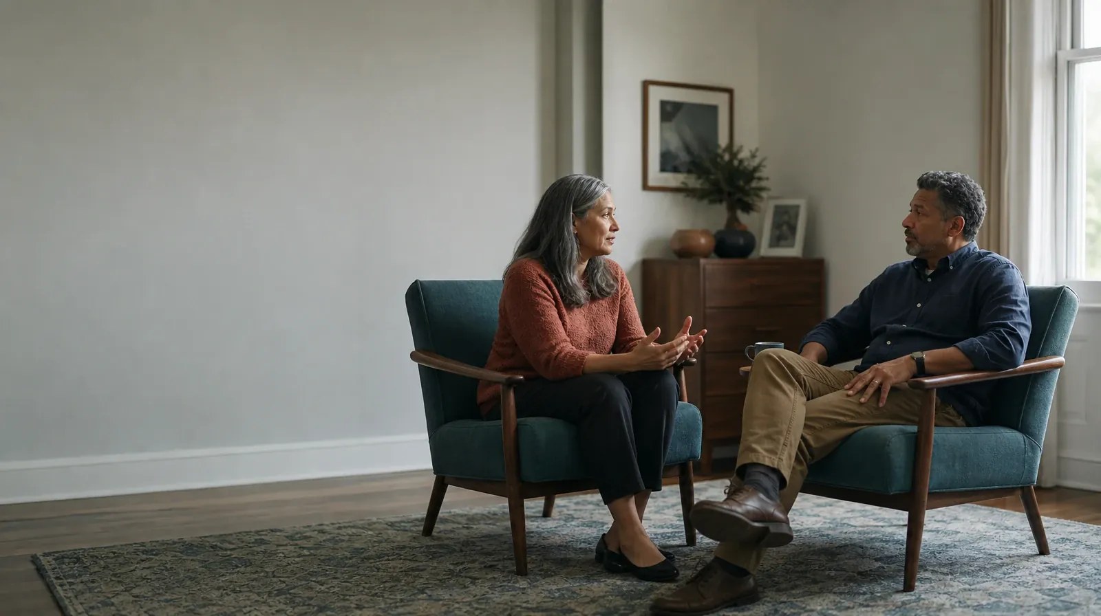 Two adults talk from separate armchairs · Preferences and Accessibility in Distress tolerance